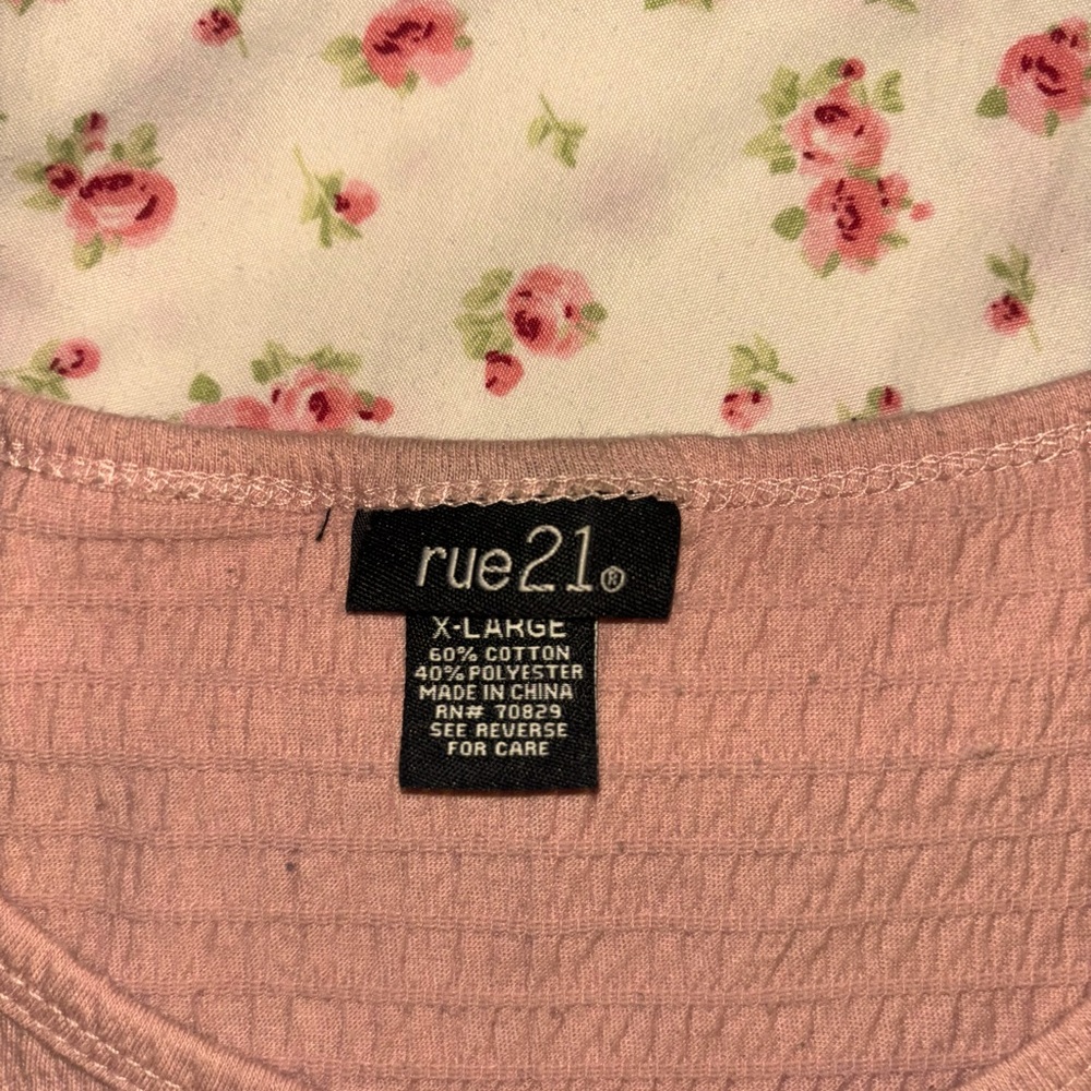 Rue 21 Flowy and Comfortable Shirt. Can honestly fit a small and medium …